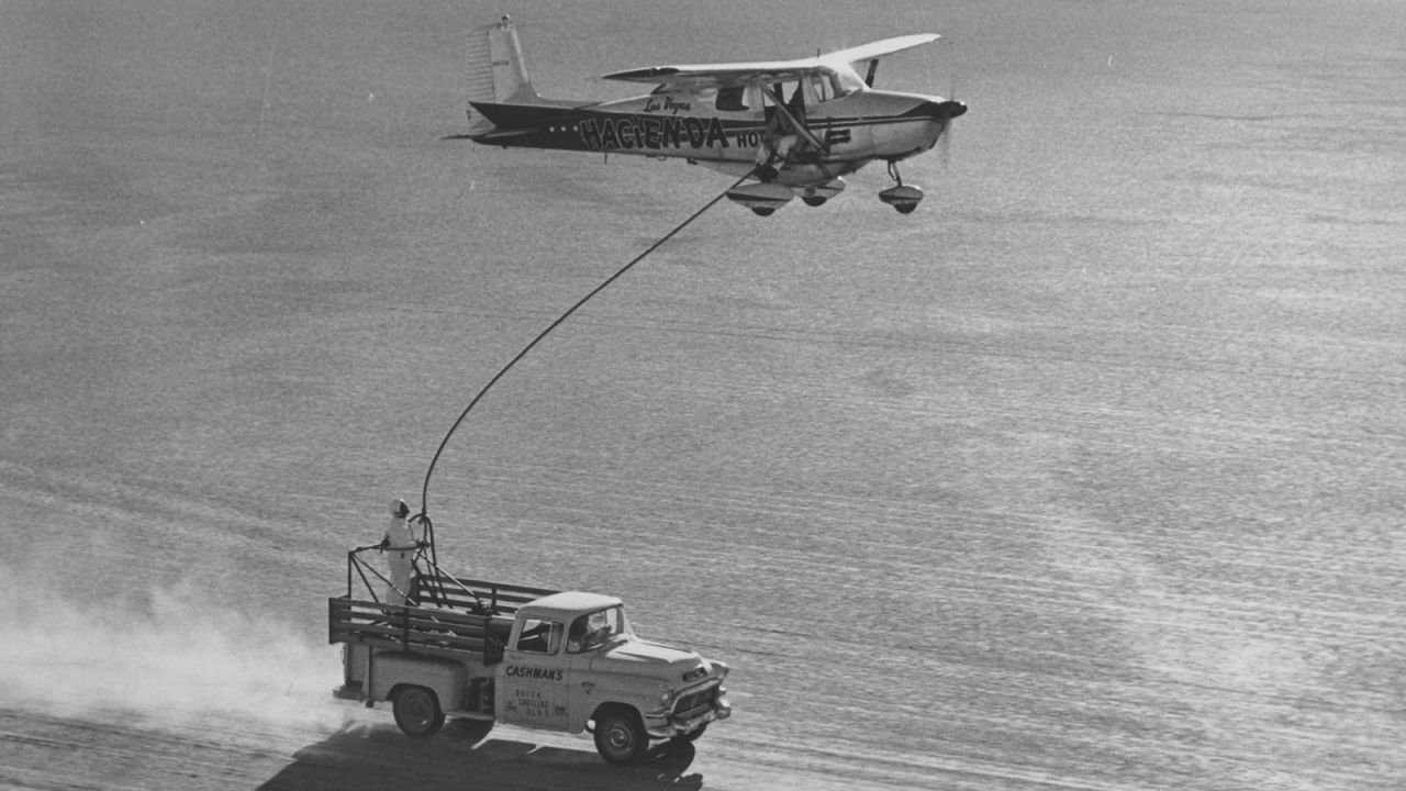 Aerial refuelling "really was a dramatic show of airmanship," says aviation historian Janet Bednarek.
