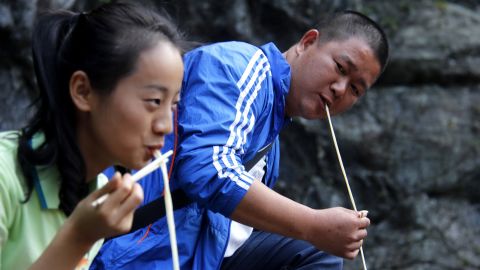When eating longevity noodles, one must take care not to bite or break the strand.