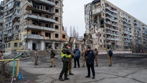 As the search and rescue operation at a destroyed apartment building in Dnipro officially ends, military and police continue to gather at the site where some 45 people, including five children, were killed on Saturday.