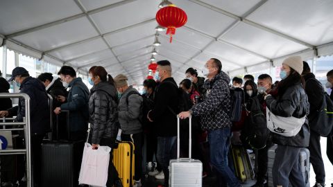 Passengers at a Shanghai railway station during the travel rush ahead of Lunar New Year, January 16, 2023. 