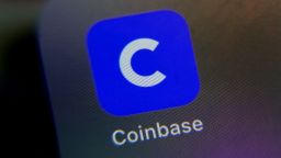 FILE - The mobile phone icon for the Coinbase app is shown in this photo, in New York, Tuesday, April 13, 2021. Coinbase said in a regulatory filing on Tuesday, Jan. 10, 2023, it is cutting approximately 950 jobs, or 20% of its workforce, in a second round of layoffs. (AP Photo/Richard Drew, File)