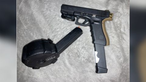 Albuquerque police have released a photo of a black Glock wearing a drum magazine. The gun, according to state senator Linda Lopez's home police, matched the shell of the gunshot.