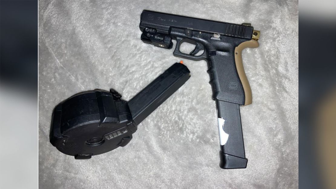 Albuquerque Police released this photo of a black Glock with a drum magazine. The gun matched shell casings from a shooting at state Sen. Linda Lopez's home police said.