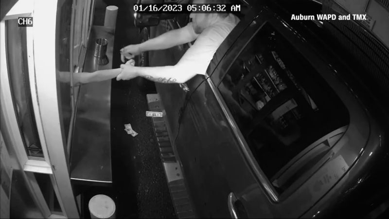 Video: See moment man tries to pull barista through drive-thru window | CNN