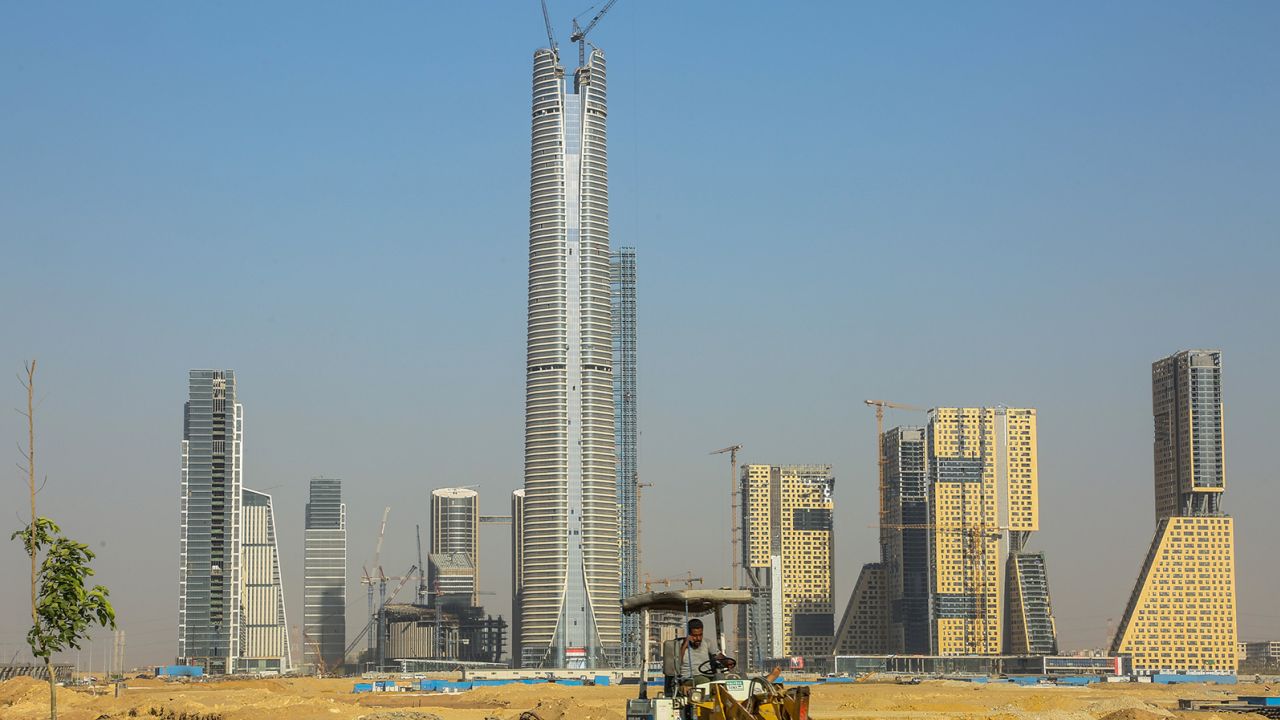 Skyscraper buildings, including the Iconic Tower, center, in the central business district of Egypt's New Administrative Capital, east of Cairo in Egypt, on Wednesday, July 27, 2022. 
