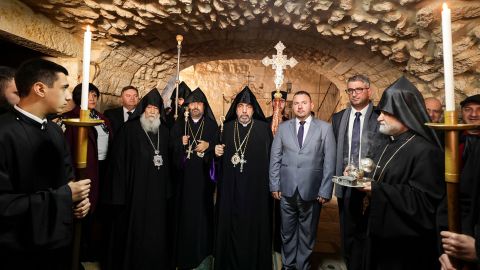 Patriarch Nurhan Manougian (C), serving the Armenian Patriarchate of Jerusalem of the Armenian Apostolic Church, celebrates the Nativity of Jesus at the Church of the Nativity in the occupied West Bank city of Bethlehem, on Wednesday.