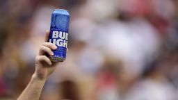 A fan holds up a can of Bud Light during a game between the New England Patriots and Washington Redskins at FedExField on October 6, 2019 in Landover, Maryland. 