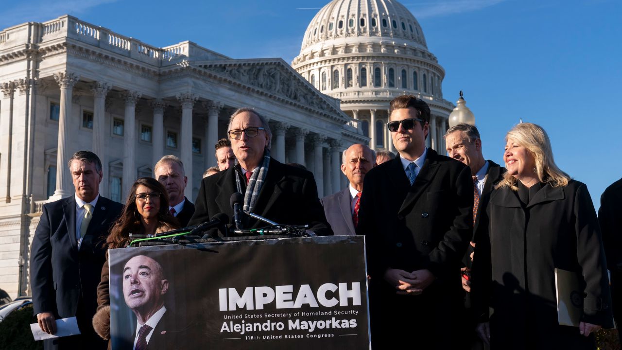 Rep. Andy Biggs, a member of the conservative House Freedom Caucus, speaks with a group of Republican lawmakers calling for the impeachment Secretary of Homeland Security Alejandro Mayorkas. He is joined in the front row by, from left, Rep. Lauren Boebert, Rep. Matt Gaetz, and Rep. Debbie Lesko.