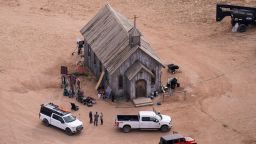 FILE - This aerial photo shows part of the Bonanza Creek Ranch film set in Santa Fe, N.M., on Saturday, Oct. 23, 2021, where cinematographer Halyna Hutchins died from a gun fired by actor Alec Baldwin. The family of a cinematographer shot and killed by Alec Baldwin on the set of the film "Rust" has agreed to settle a lawsuit against Baldwin and the movie's producers, and production will resume on the project. (AP Photo/Jae C. Hong, File)