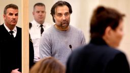 Brian Walshe, center, listens during his arraignment Wednesday, Jan. 18, 2023, at Quincy District Court, in Quincy, Mass., on a charge of murdering his wife Ana Walshe. Not guilty pleas were entered on behalf of Walshe, 47. Ana Walshe was reported missing Jan. 4, 2023 by her employer in Washington, where the couple has a home. (Craig F. Walker/The Boston Globe via AP, Pool)