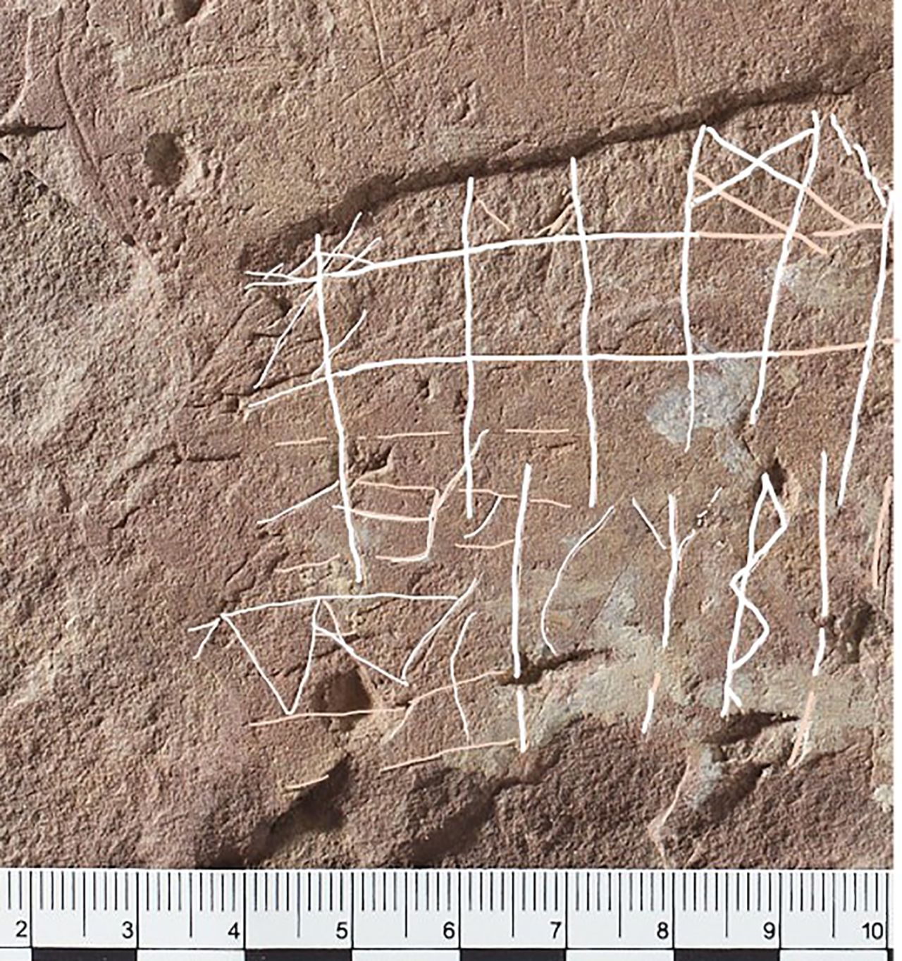 The stone features "unexpected" inscriptions.