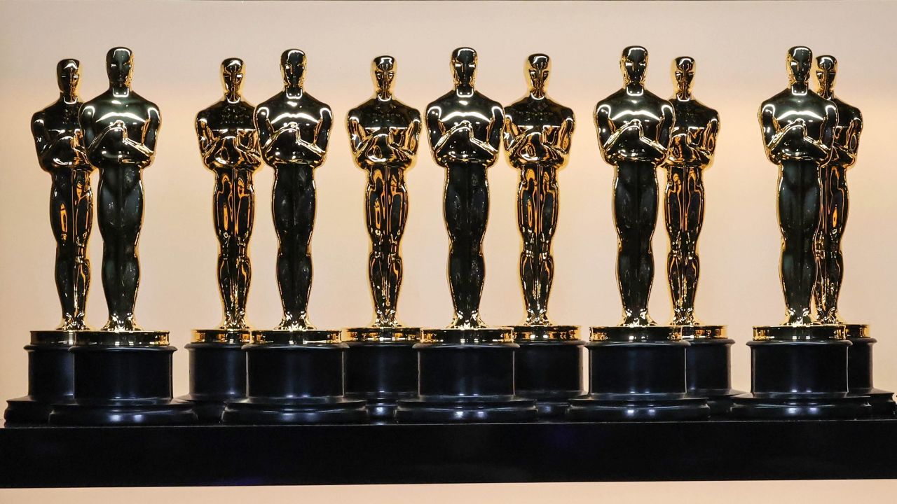 Oscar statuettes sit on display backstage during the show at the 94th Academy Awards at the Dolby Theatre at Ovation Hollywood on Sunday, March 27, 2022.  