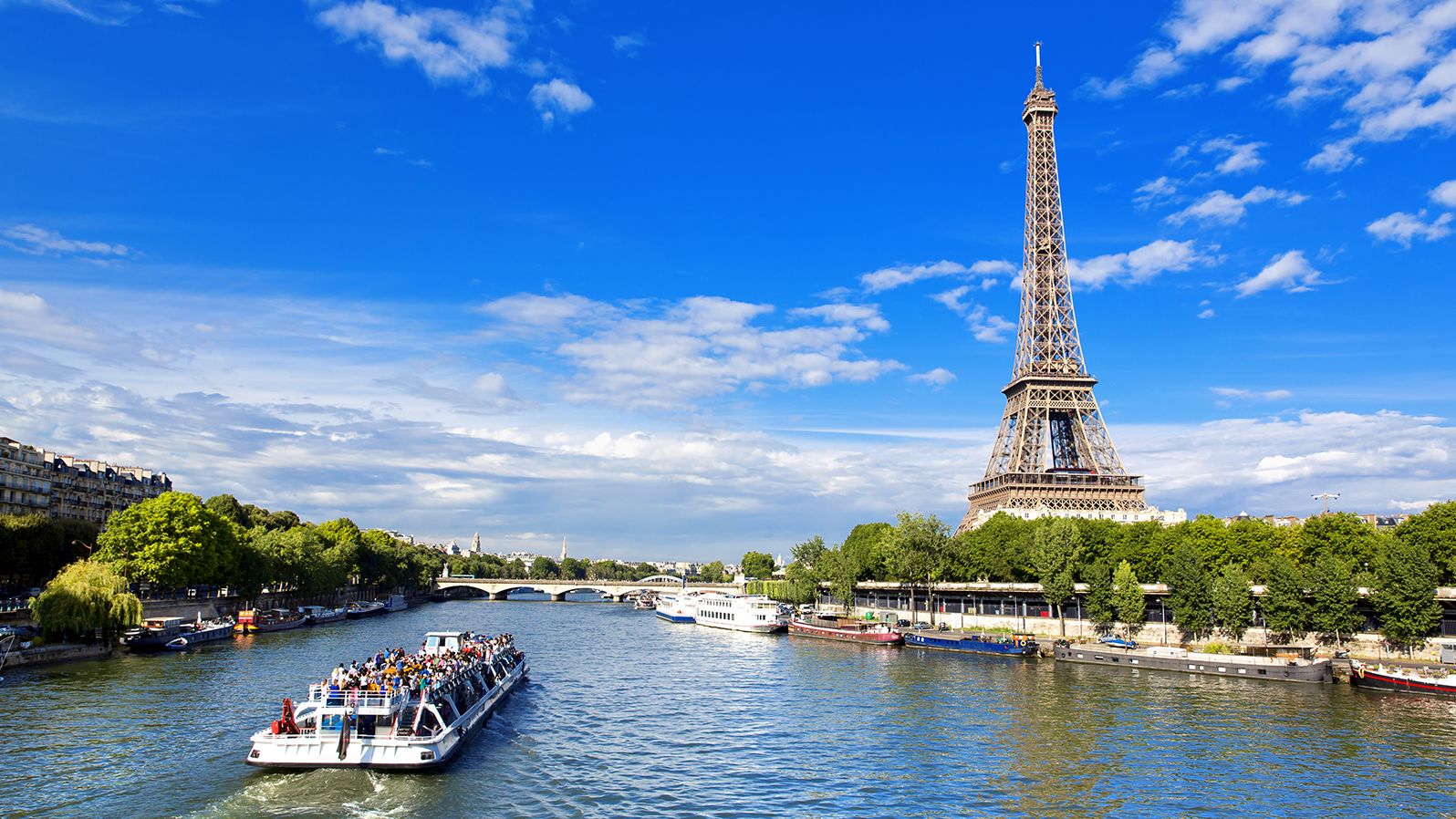 Paris, the beautiful view of the Eiffel Tower on a summer day