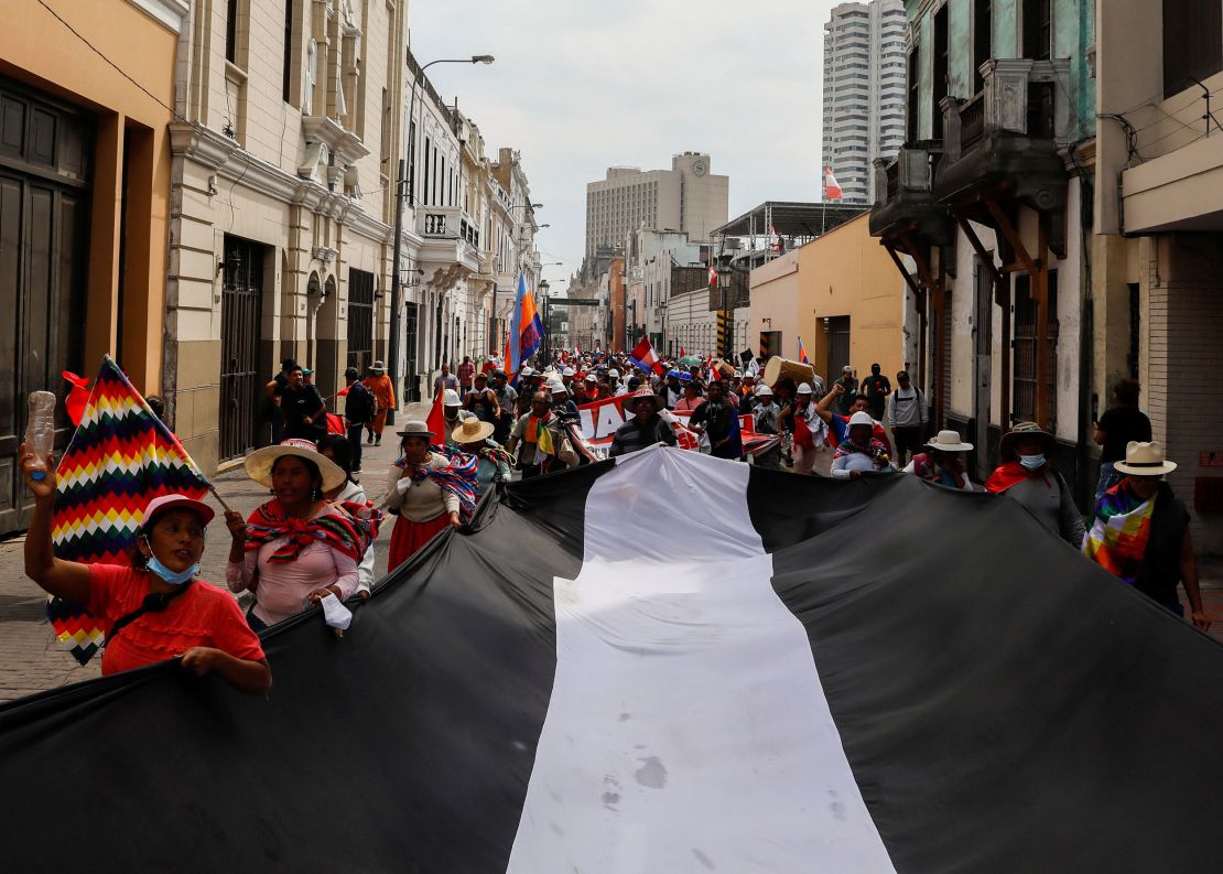 Protesters are seen in Lima on Thursday. 