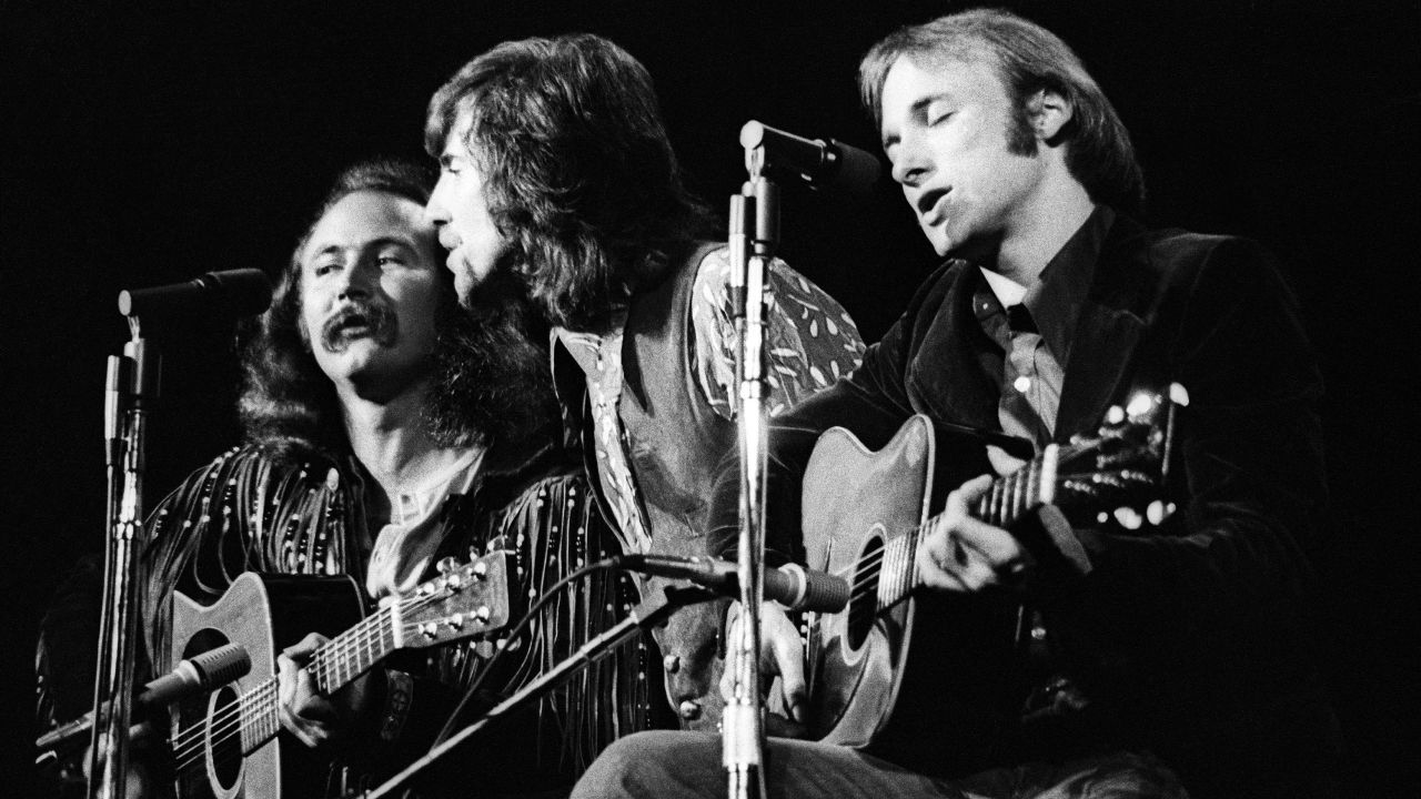 (From left) David Crosby, Graham Nash and Stephen Stills of Crosby, Stills & Nash perform in concert at Olympia Stadium on June 12, 1970 in Detroit.