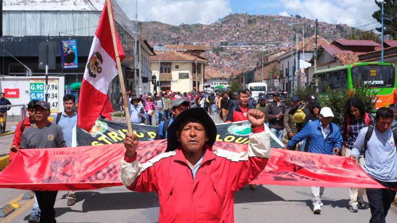 Protests erupt in Peru as thousands of police officers deploy to guard capital – CNN
