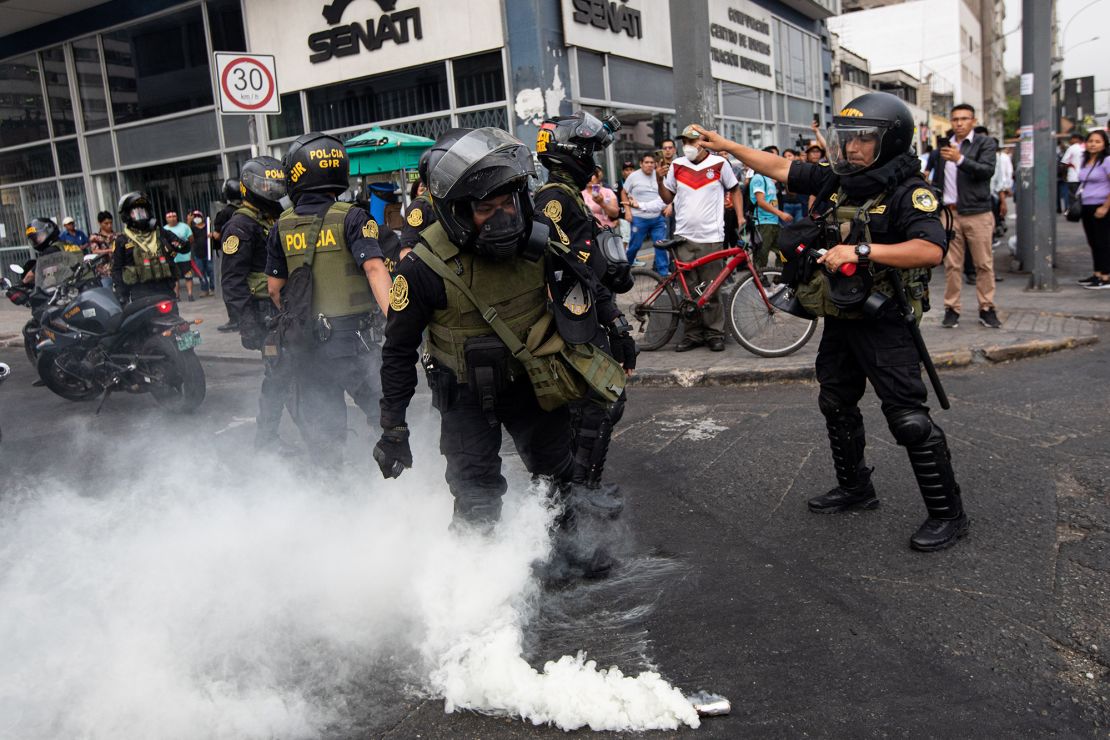 Police are pictured in the capital Lima on Wednesday.