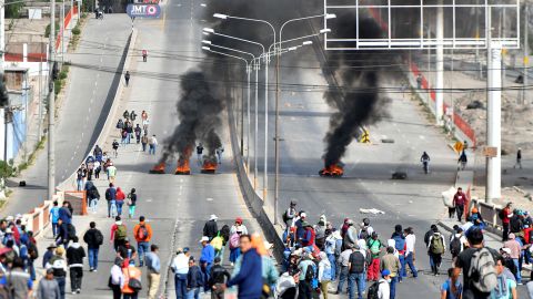 Demonstrators are seen in the city of Arequipa, Peru, on Thursday.