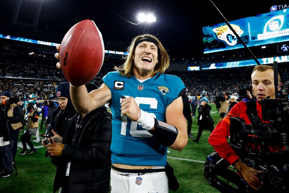 Jacksonville Jaguars quarterback Trevor Lawrence celebrates on the field after <a href="https://www.cnn.com/2023/01/15/sport/jacksonville-jaguars-los-angeles-chargers-nfl-playoff-comeback/index.html" target="_blank">a massive comeback</a> against the Los Angeles Chargers in a wild card playoff football game on Saturday, January 14. Lawrence threw four touchdowns — after throwing four interceptions — as he led the Jaguars back from 27-0 down in the first half to beat the Chargers 31-30. <a href="https://www.cnn.com/2022/09/12/sport/gallery/nfl-2022-season/index.html" target="_blank">See the best photos from the 2022 NFL season.</a>