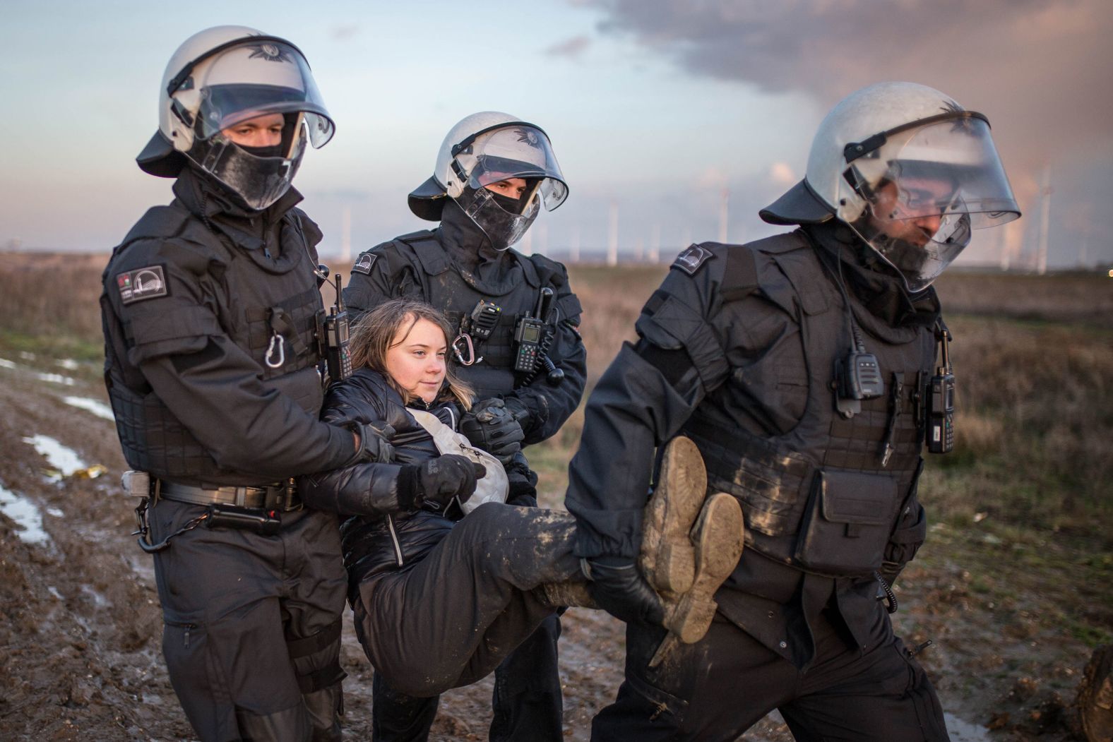 Police officers detain climate activist Greta Thunberg at a demonstration against the expansion of the Garzweiler coal mine in Lützerath, Germany, on Tuesday, January 17.