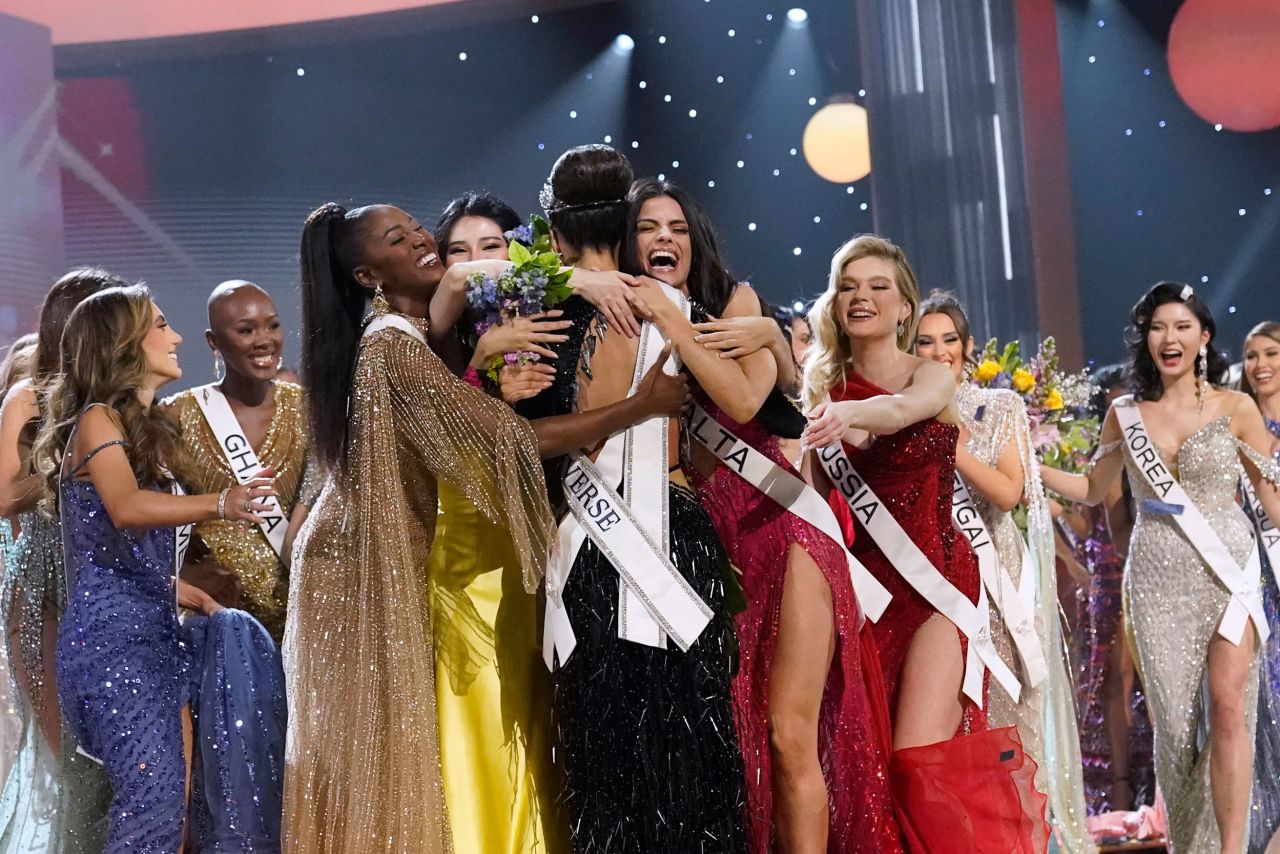 R'Bonney Gabriel of america is hugged by other contestants after being <a href=