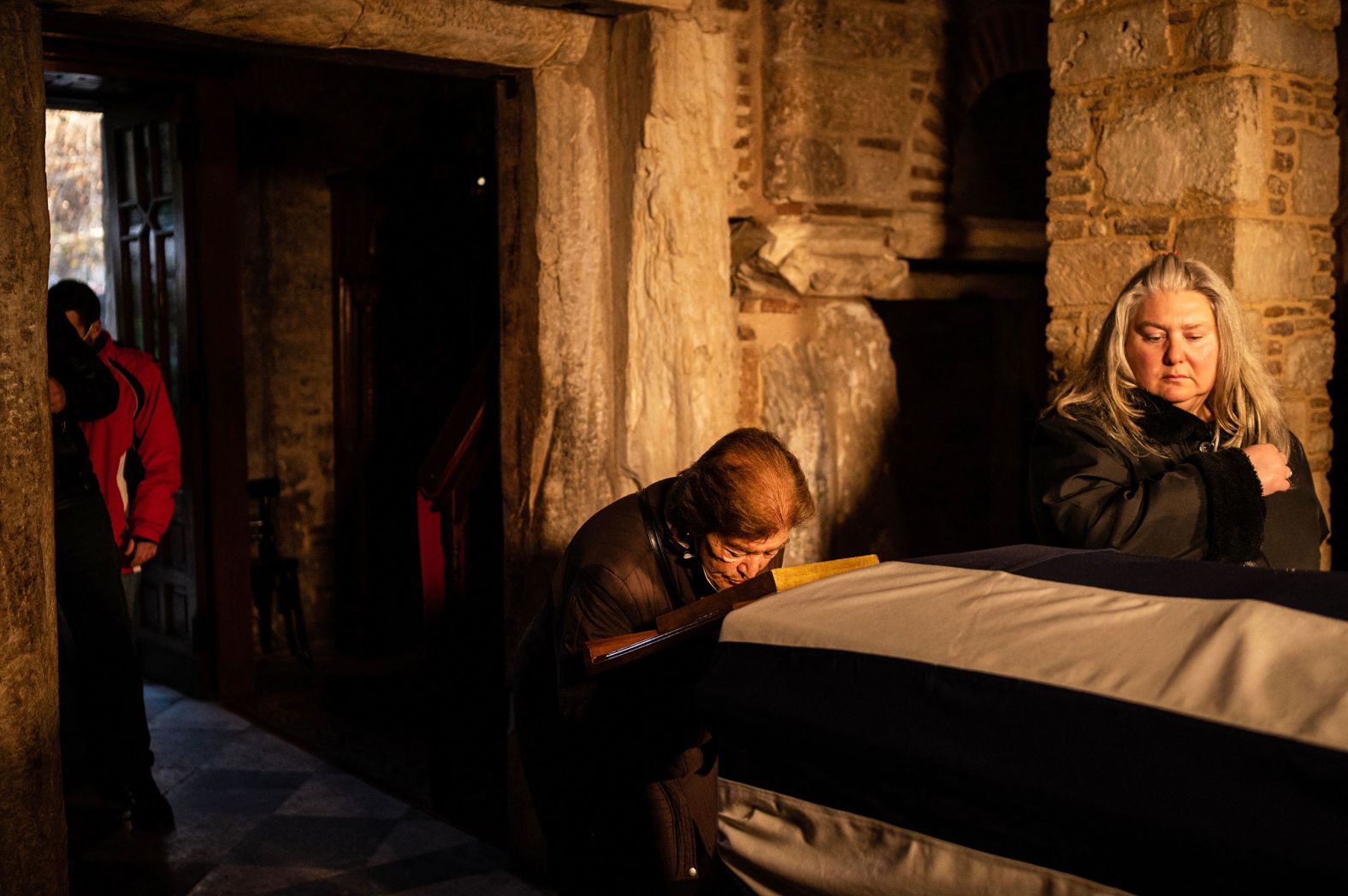 A mourner pays her respects to the former King of Greece, Constantine II, at Saint Eleftherios chapel in Athens on Monday, January 16. CNN affiliate CNN Greece reported on Tuesday that the former King had experienced serious health problems in the past few months and recently contracted <a href="https://www.cnn.com/videos/world/2023/01/10/china-reopens-borders-covid-restrictions-wang-intl-cprog-vpx.cnn" target="_blank">coronavirus</a> for the second time, which appeared to have significantly worsened his condition.