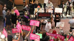 Protesters who support more abortion restrictions and protestors who upset at the recent U.S. Supreme Court ruling removing protections for abortions demonstrate in the lobby of the South Carolina Statehouse on Tuesday, June 28, 2022, in Columbia South Carolina.