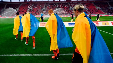 Players from Shakhtar Donetsk prepare to face Olympiacos FC in the team's peace tour last year. 