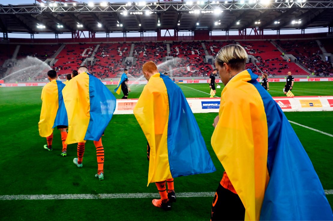 Players from Shakhtar Donetsk prepare to face Olympiacos FC in the team's peace tour last year. 