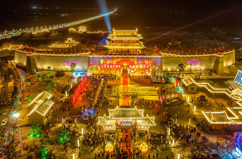 People visit a lantern show at a tourist attraction on Tuesday, January 17, ahead of the Lunar New Year in Yuncheng, China.