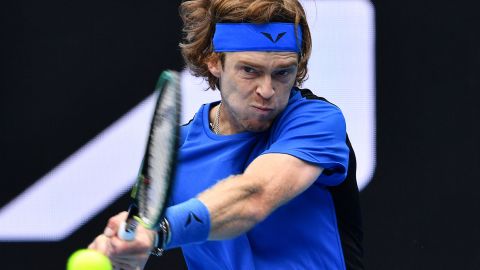 Russia's Andrey Rublev hits a return against Finland's Emil Ruusuvuori during their men's singles match on day four of the Australian Open.
