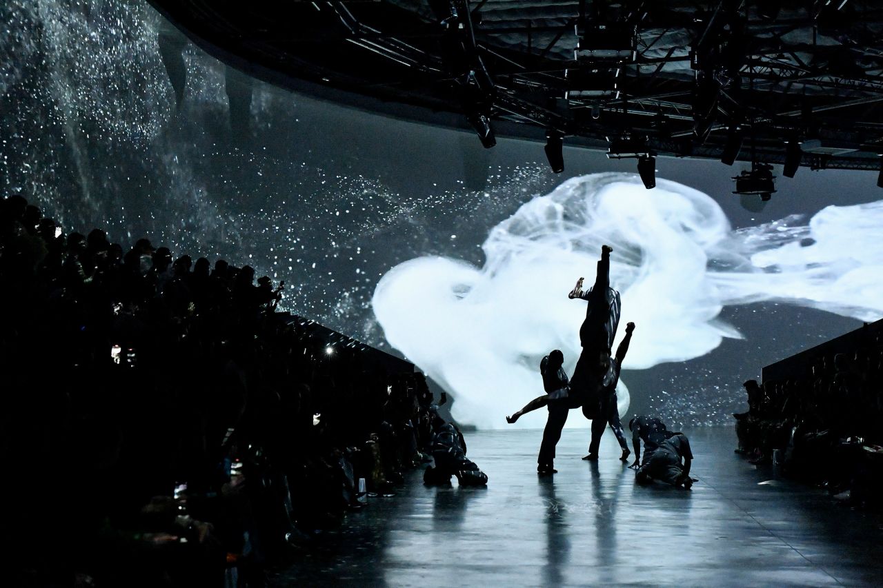 A dancing interlude demonstrated movement of the clothes at Issey Miyake's catwalk.