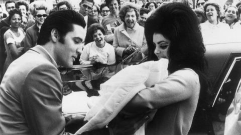 Elvis and Priscilla Presley with their daughter Lisa Marie in 1968.