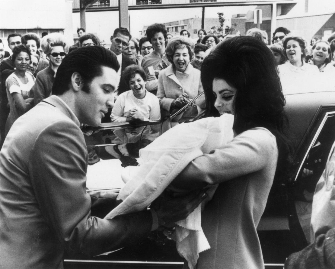 Elvis and Priscilla Presley with their daughter Lisa Marie in 1968.