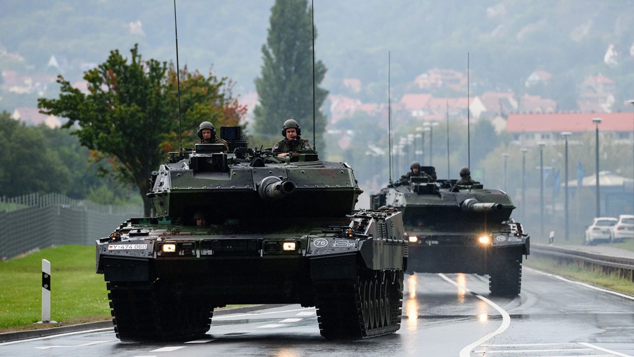 Two Leopard 2 A7V battle tanks are pictured prior to an event to mark the reception of the first units of the new tank on September 15, 2021 in Bad Frankenhausen, Germany. 