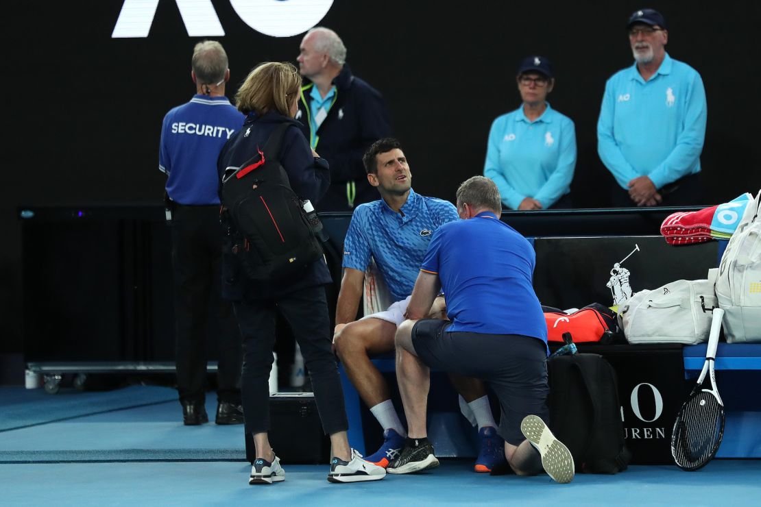 Djokovic receives attention during a medical time on Saturday. 