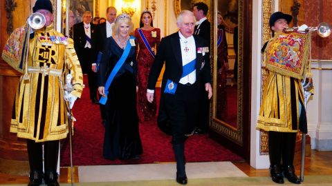 King Charles III and the Queen Consort attend a reception at Buckingham Palace on 6 December.