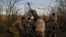BAKHMUT, UKRAINE - DECEMBER 29: Soldiers of the Ukrainian 55th artillery brigade operate on the frontline with a US made Howitzer M777 cannon amid artillery fights on December 29, 2022 in Bakhmut, Ukraine. A large swath of Donetsk region has been held by Russian-backed separatists since 2014. Russia has tried to expand its control here since the February 24 invasion.  (Photo by Pierre Crom/Getty Images)