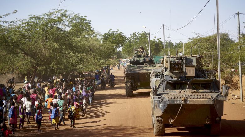 TOPSHOT - Soldiers of the French Army patrols the village Gorom Gorom in Armoured Personnel Carriers during the Barkhane operation in northern Burkina Faso on November 14, 2019. (Photo by MICHELE CATTANI / AFP) (Photo by MICHELE CATTANI/AFP via Getty Images)