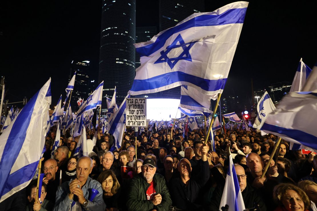Israeli protesters attend a rally against  Netanyahu's new  government in Tel Aviv on January 21, 2023.