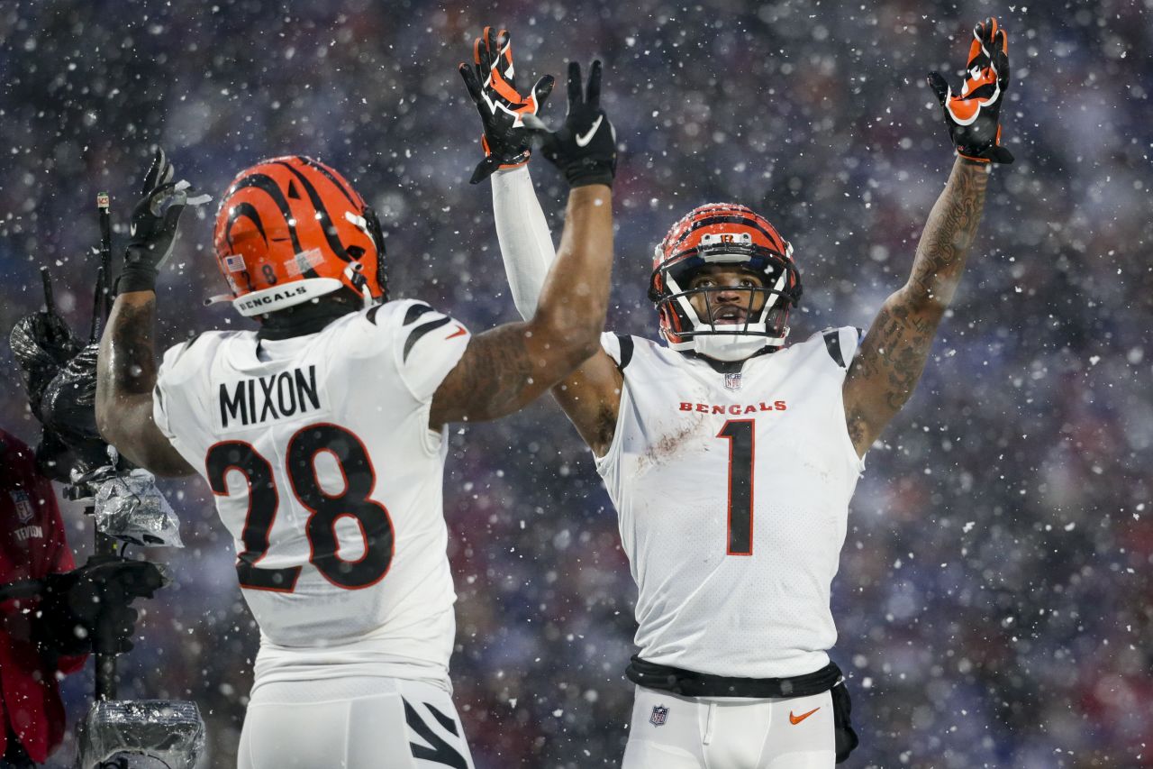 Cincinnati Bengals wide receiver Ja'Marr Chase and running back Joe Mixon motion for a touchdown against the Buffalo Bills during the third quarter. Both Chase and Mixon had TDs as the Bengals convincingly beat the Bills 27-10 to advance to the AFC Championship game. 