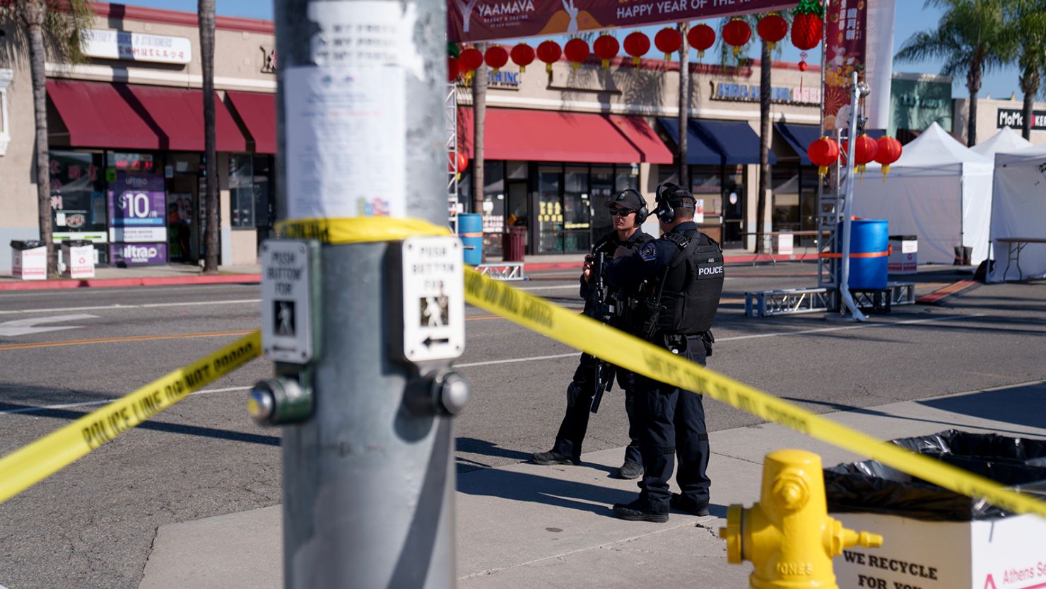 Police officers stand guard near the scene of a deadly shooting on January 22, 2023 in Monterey Park, California. 