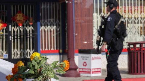 Mourners leave flowers near the site of the massacre during Lunar New Year celebrations in Monterey Park.