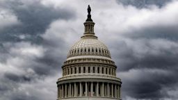 Storm clouds pass over the US Capitol in Washington, DC, on January 23.