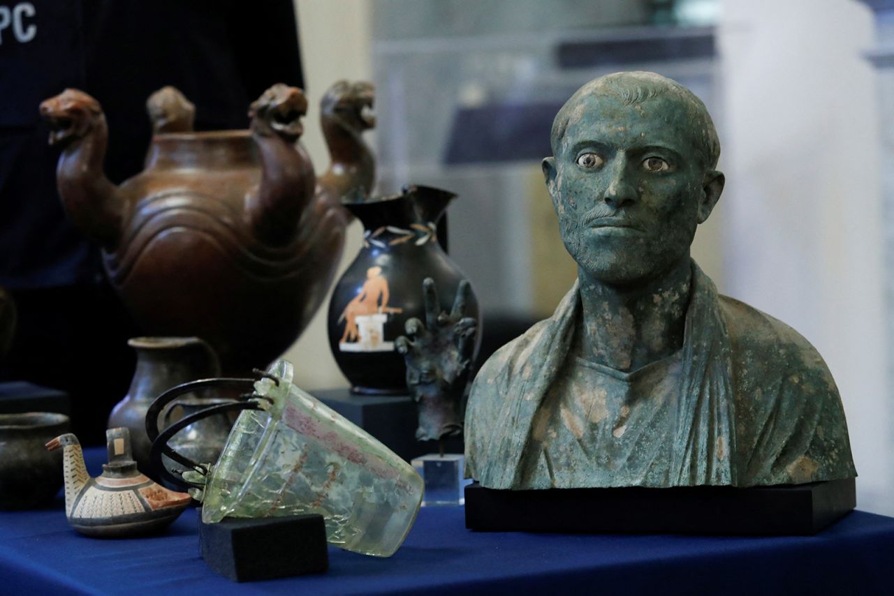 The seized artifacts went on display in Rome's Spadolini Hall.