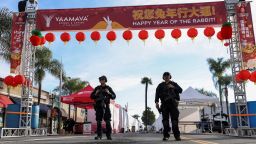 Police officers guard the area near the location of a shooting that took place during a Chinese Lunar New Year celebration, in Monterey Park, California, U.S. January 22, 2023 