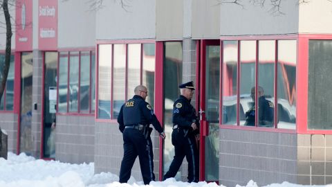 Police investigate the shooting that left two dead on January 23, 2023, in Des Moines, Iowa.
