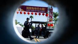 Monterey Park, CA - January 22:Monterey Park Police stand guard at the closed Lunar New Year festival site on Sunday, January 22, 2023 after a mass shooting Star Dance Studio Saturday night killed 10 near the festival. 