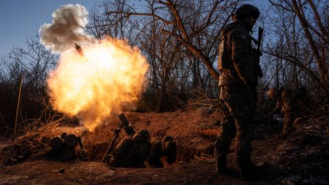 Ukrainian servicemen fire a 120mm mortar towards Russian positions at the frontline near Bakhmut, Donetsk region, Ukraine, Wednesday, Jan. 11, 2023. 