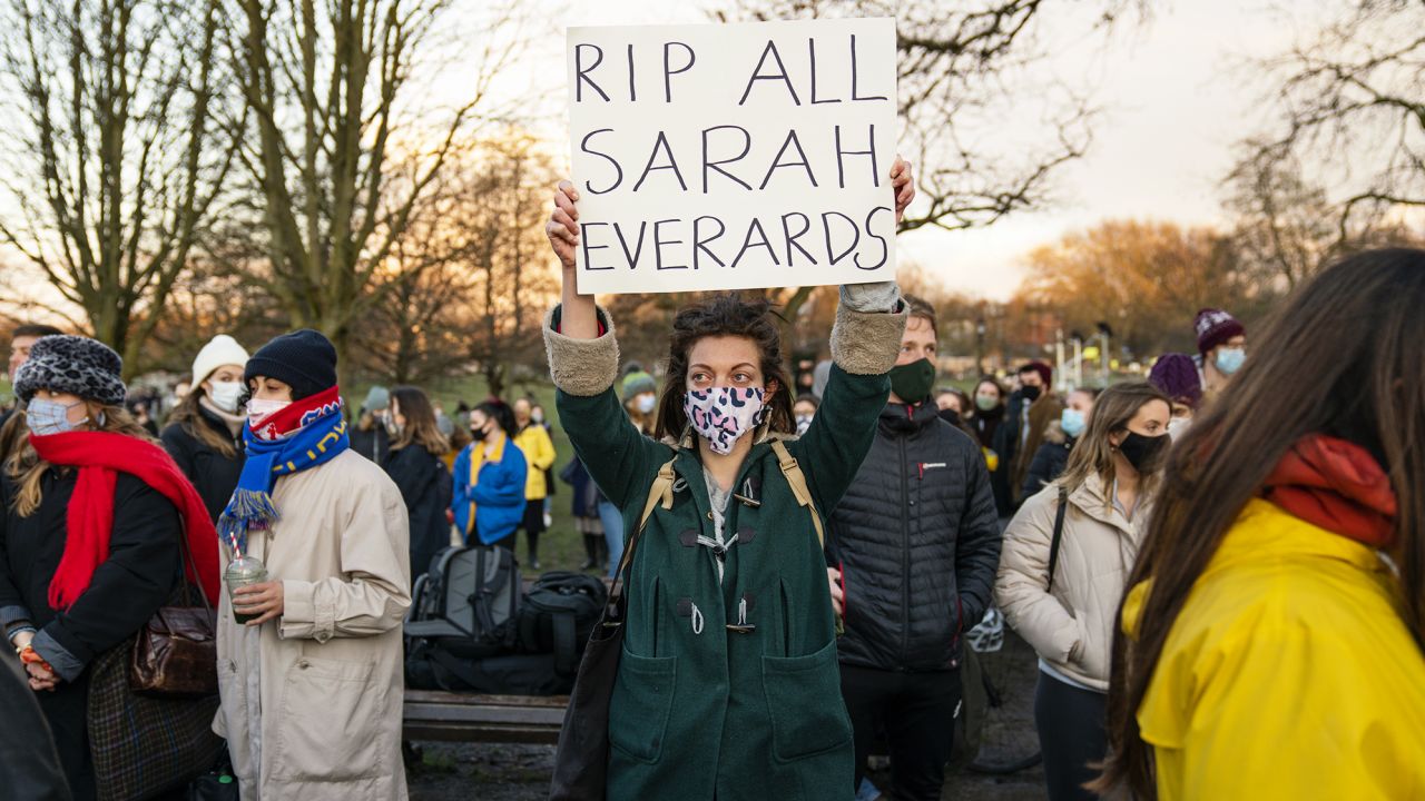 A demonstrator holds a placard at the vigil for Sarah Everard.
